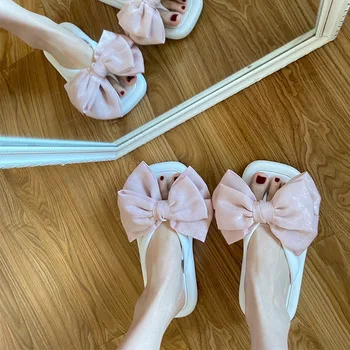 2022 Yaz Yeni Yay-düğüm Clip-on Flip-flop kadın Yabancı Stil Düz Tabanlı sandaletler ve terlikler kadın Yaz Moda